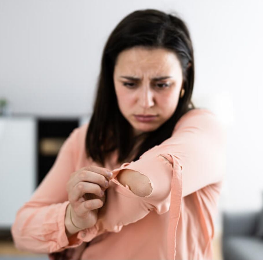 fixing holes in garments with machine embroidery image