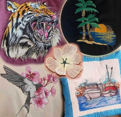 image 1797 Various machine embroidery designs including tiger, cherry blossoms, etc.